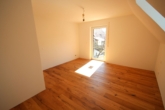Wohnzimmer - Helle, moderne Wohnung mit Südbalkon, Gartenanteil und effizienter Energietechnik